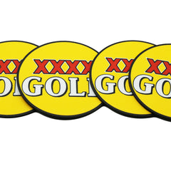 Four yellow circular signs with 'XXXX GOLD' printed on them.